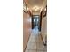 Hallway with tile flooring leading to other rooms of the home at 8244 Sw 106Th Pl, Ocala, FL 34481