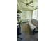 Bright sunroom with lots of natural light, carpeted floor and comfortable seating at 8244 Sw 106Th Pl, Ocala, FL 34481