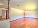 A spacious living room that is filled with natural light and beautiful hardwood floors at 834 Ne 10Th Ave, Ocala, FL 34470