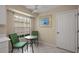 Cozy dining area features tile flooring and a window view to the exterior at 8617 Se 141St Street Rd, Summerfield, FL 34491