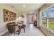 This lovely dining area features modern décor, lots of natural light, and seating for six at 8653 Sw 44Th Ter, Ocala, FL 34476