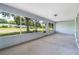 View of the large screened patio with view to the backyard at 9287 Sw 91St Court Rd, Ocala, FL 34481