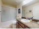 Bathroom with a shower-tub combo and a single vanity at 9677 Sw 56Th Cir, Ocala, FL 34476