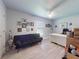 Bedroom with a futon and ceiling fan at 9677 Sw 56Th Cir, Ocala, FL 34476