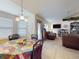 Open dining area connects seamlessly to the living room, ideal for entertaining guests at 9677 Sw 56Th Cir, Ocala, FL 34476