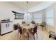 Charming dining nook offers bright windows, stylish lighting, and seating for four at 9677 Sw 56Th Cir, Ocala, FL 34476