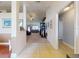 Inviting foyer with tiled floors that transitions into a carpeted living space at 9677 Sw 56Th Cir, Ocala, FL 34476
