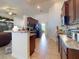 Modern kitchen features sleek countertops, tile flooring, and stainless steel appliances at 9677 Sw 56Th Cir, Ocala, FL 34476