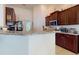 Well-equipped kitchen with ample counter space, updated appliances, and abundant cabinet space at 9677 Sw 56Th Cir, Ocala, FL 34476