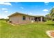 Well maintained backyard featuring decorative landscaped flower beds at 9958 Sw 59Th Cir, Ocala, FL 34476