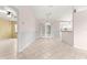 Open concept dining area featuring tile floors, and views into the kitchen at 9958 Sw 59Th Cir, Ocala, FL 34476