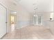 Open concept dining area featuring tile floors and views into the bathroom at 9958 Sw 59Th Cir, Ocala, FL 34476
