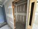 Unfinished walk-in closet with drywall walls and a wood frame at 1057 Nw 68Th Pl, Ocala, FL 34474