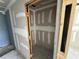 Interior shot of new drywall install in an empty room with an unfinished closet in the new home at 1057 Nw 68Th Pl, Ocala, FL 34474