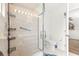 Elegant bathroom featuring a spacious glass-enclosed shower and contemporary fixtures for a luxurious experience at 11245 Sw 63Rd Terrace Rd, Ocala, FL 34476