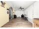 Enclosed patio with ceiling fan, neutral colors, and comfortable seating at 11245 Sw 63Rd Terrace Rd, Ocala, FL 34476