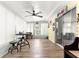 Enclosed patio area with ceiling fan and patio furniture at 11245 Sw 63Rd Terrace Rd, Ocala, FL 34476
