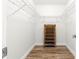 Walk-in closet with shelving and a shoe organizer for efficient storage, keeping your belongings organized at 11245 Sw 63Rd Terrace Rd, Ocala, FL 34476