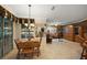 Bright dining area with a chandelier and sliding glass doors for lots of natural light at 13786 Se 88Th Ct, Summerfield, FL 34491