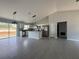 Modern kitchen with stainless steel appliances, granite countertops, and open layout at 15419 Sw 65Th Terrace Rd, Ocala, FL 34473