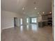 Open living room and kitchen concept with tile flooring, recessed lighting, and lots of natural light at 15833 Se 97Th Ter, Summerfield, FL 34491