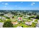Aerial view of a home boasting a private pool and manicured landscaping in a peaceful neighborhood at 17915 Se 102Nd Ter, Summerfield, FL 34491