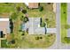 Aerial view of the home, highlighting the pool, landscaping, and surrounding neighborhood at 17915 Se 102Nd Ter, Summerfield, FL 34491
