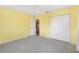 Bright bedroom features ensuite and large closet at 17915 Se 102Nd Ter, Summerfield, FL 34491