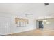 Bright living room featuring hardwood floors, a ceiling fan, and natural light at 17915 Se 102Nd Ter, Summerfield, FL 34491