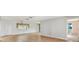 Spacious living room features hardwood floors and bright natural light at 17915 Se 102Nd Ter, Summerfield, FL 34491