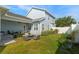 Spacious backyard with a patio, fire pit area, playground, and well-maintained lawn at 1906 Se 28Th Pl, Ocala, FL 34471