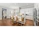 Modern kitchen with a large island, seating, and stainless steel appliances at 1906 Se 28Th Pl, Ocala, FL 34471