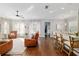 Bright and spacious living room with hardwood floors and comfortable seating at 1906 Se 28Th Pl, Ocala, FL 34471