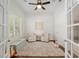 Bright and airy home office with neutral tones and large windows at 1906 Se 28Th Pl, Ocala, FL 34471