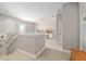 Upstairs landing with workspace and a decorative accent wall at 1906 Se 28Th Pl, Ocala, FL 34471