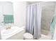 Bathroom featuring marble shower and neutral wall color at 2406 Se 40Th Street Rd, Ocala, FL 34480