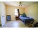Cozy bedroom featuring blue accents and wood-look flooring at 2406 Se 40Th Street Rd, Ocala, FL 34480