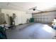 Spacious garage with coated flooring and room for storage at 2406 Se 40Th Street Rd, Ocala, FL 34480
