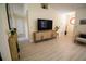 Bright and open living space with wood-look floors and modern decor at 2406 Se 40Th Street Rd, Ocala, FL 34480