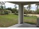 View from covered porch looking out to the expansive yard and green space at 2438 Sw 165Th Street Rd, Ocala, FL 34473