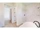 Bathroom with a luxurious tile shower and a modern, standalone tub at 2438 Sw 165Th Street Rd, Ocala, FL 34473