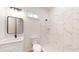 Modern bathroom features white marble style tile, black fixtures, a sink and walk-in shower at 2438 Sw 165Th Street Rd, Ocala, FL 34473