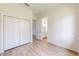 Bedroom includes a closet and flows into an attached bathroom at 2438 Sw 165Th Street Rd, Ocala, FL 34473