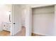View of a modern closet with white wire shelving, accessed from an open doorway at 2438 Sw 165Th Street Rd, Ocala, FL 34473