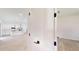 Entryway view into a modern home with an open-concept living space and stylish kitchen at 2438 Sw 165Th Street Rd, Ocala, FL 34473