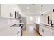 Kitchen featuring stainless appliances, quartz countertops, and pendant lights at 2438 Sw 165Th Street Rd, Ocala, FL 34473