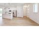 View of open-concept kitchen and living area with sleek island and modern appliances at 2438 Sw 165Th Street Rd, Ocala, FL 34473