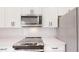 Stainless appliances and quartz countertops in this modern kitchen at 2438 Sw 165Th Street Rd, Ocala, FL 34473