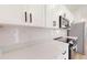 Modern kitchen featuring stainless appliances and quartz countertops at 2438 Sw 165Th Street Rd, Ocala, FL 34473