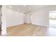 A bright living room with recess lighting and light wood flooring is adjacent to an open entryway at 2438 Sw 165Th Street Rd, Ocala, FL 34473
